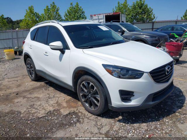  Salvage Mazda Cx